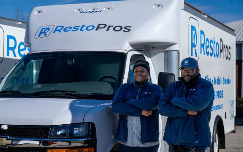 RestoPros of Central Maryland team beside a restoration truck